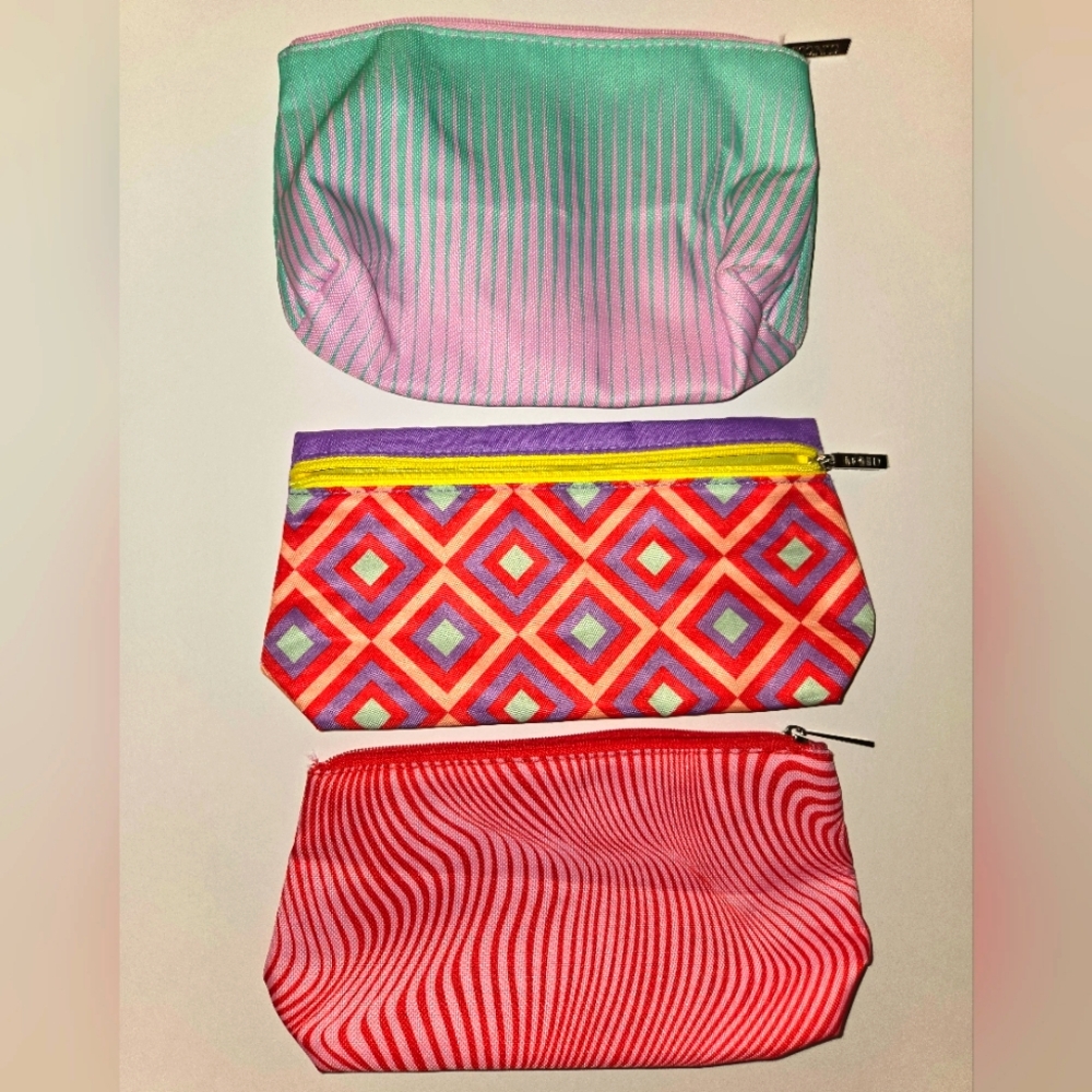 Set of 3 New Clinique cosmetic bag clutches